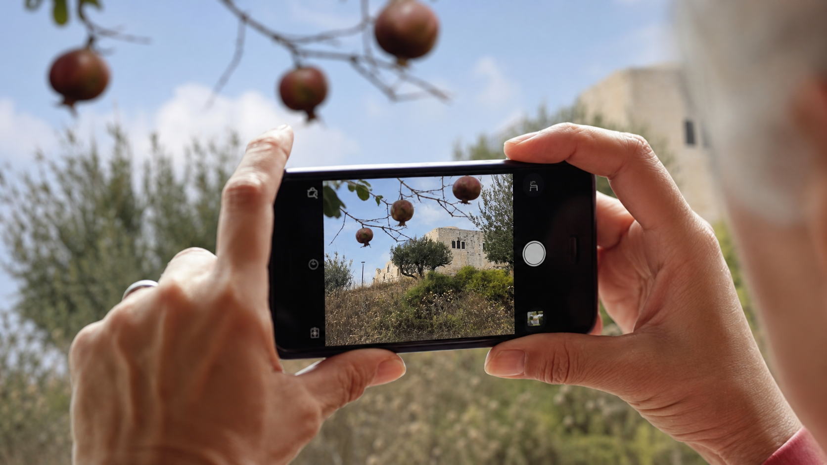 קבוצת משתתפים בסדנת צילום בנייד